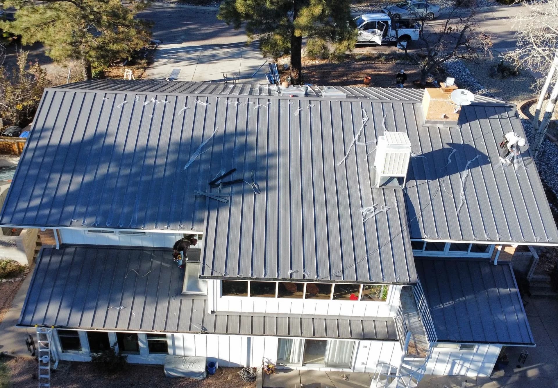 New standing-seam metal roof installation, aerial view