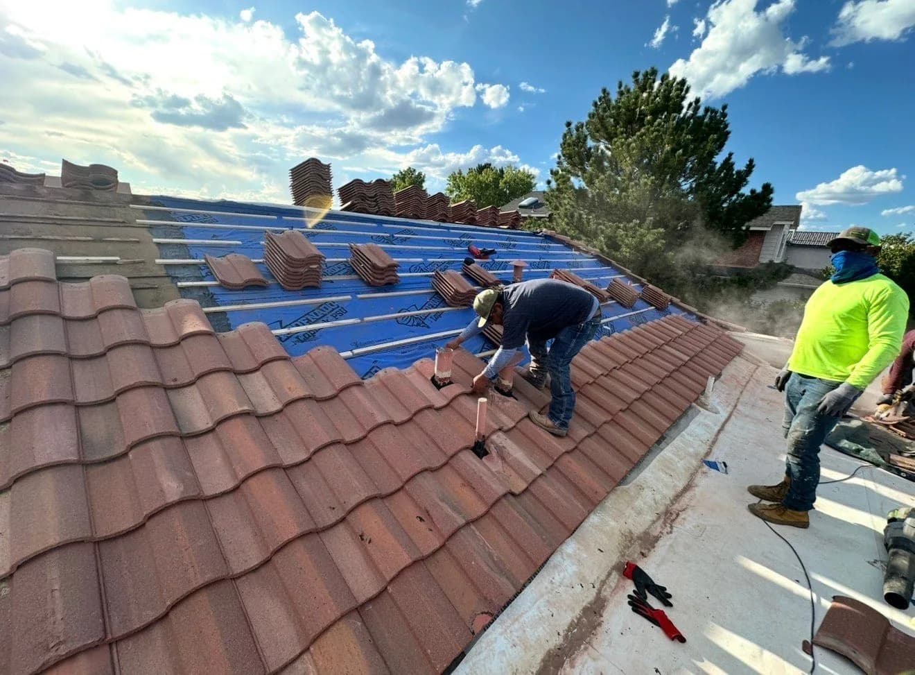 White Rock Roofing crew member on a roof